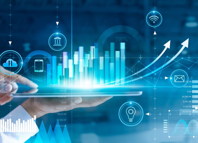 Businessman using tablet analyzing sales data and economic growth graph chart. Business strategy. Abstract icon. Digital marketing.